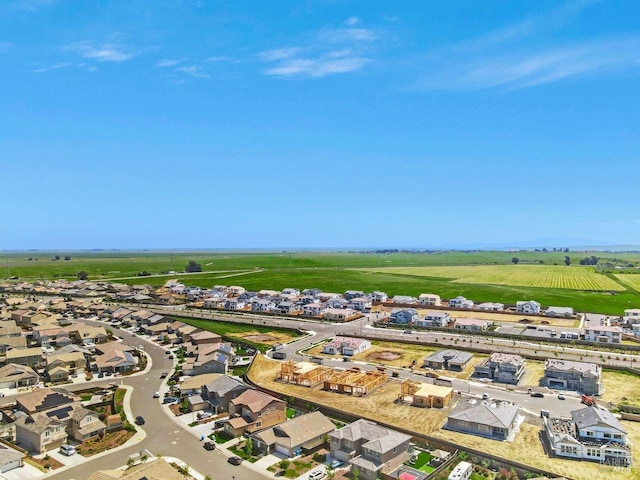 drone / aerial view with a residential view and a rural view
