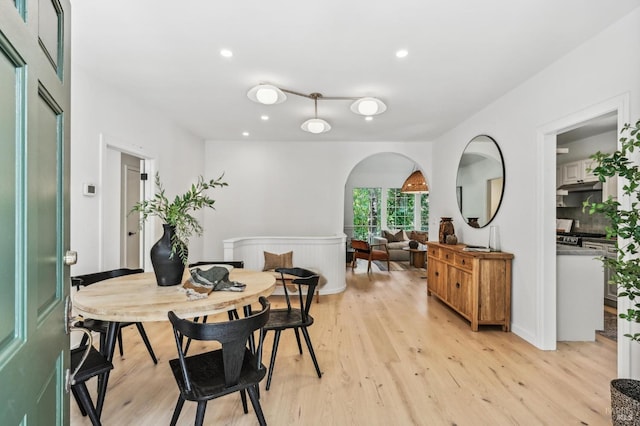 354 Forrest Ave, Fairfax, CA 94930 - dining area with light wood finished floors, arched walkways, and recessed lighting