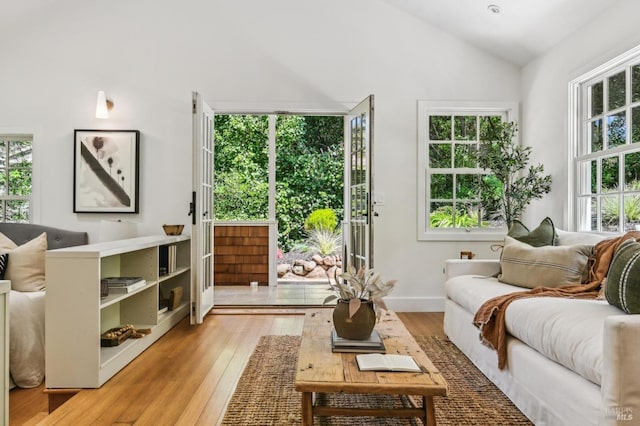 354 Forrest Ave, Fairfax, CA 94930 - living room with vaulted ceiling and light wood-style floors