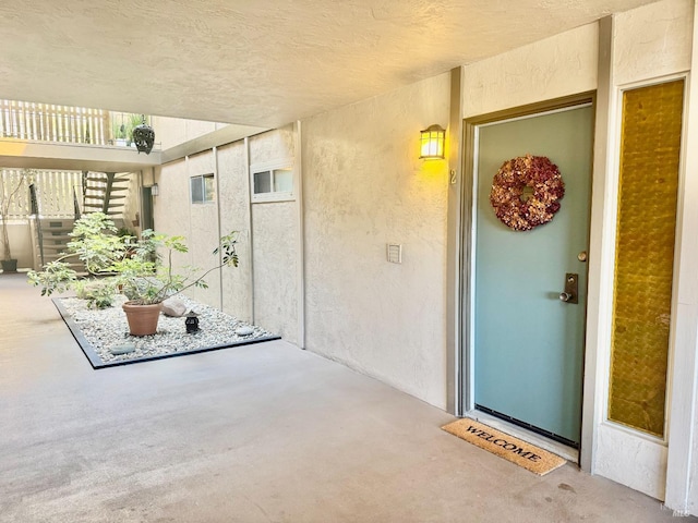 50 Via Belardo Unit 12, Greenbrae, CA 94904 - entrance to property featuring stucco siding and a patio area