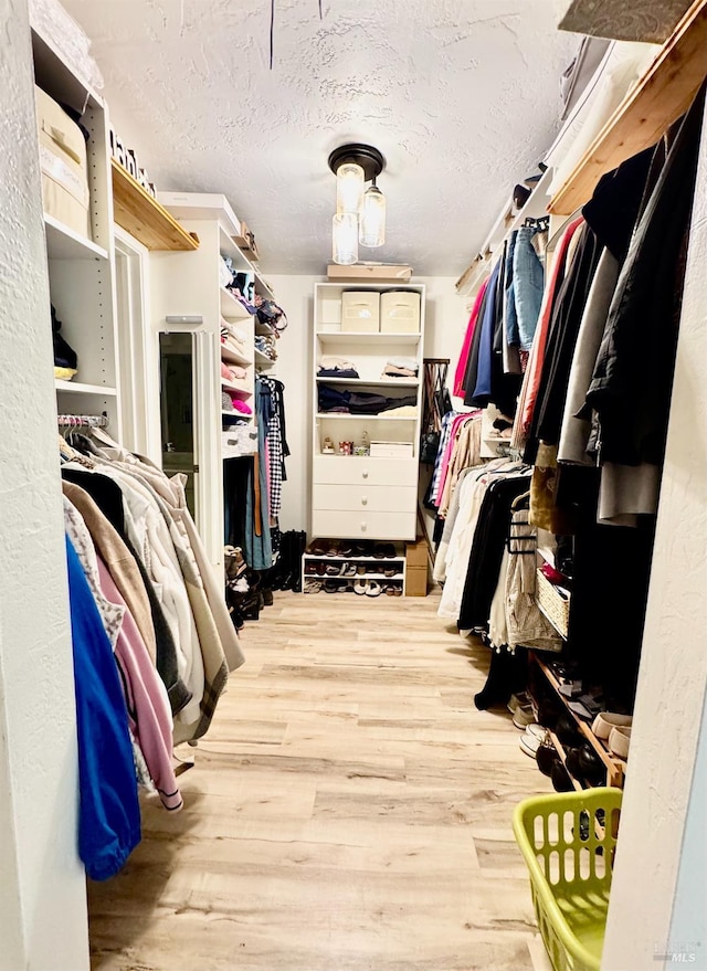50 Via Belardo Unit 12, Greenbrae, CA 94904 - walk in closet with wood finished floors