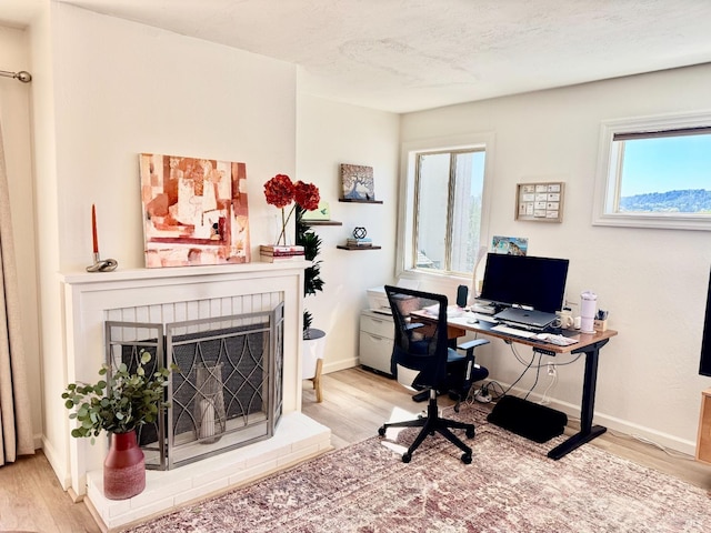 50 Via Belardo Unit 12, Greenbrae, CA 94904 - office area featuring wood finished floors and a fireplace