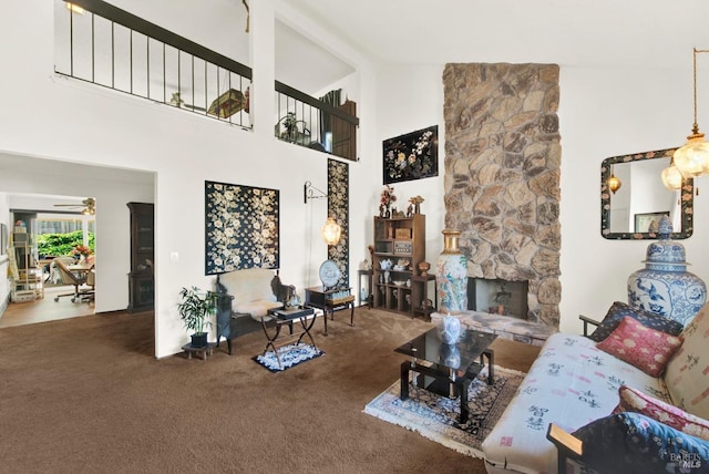 410 Duvall Ct, Benicia, CA 94510 - living area with ceiling fan, a fireplace, a towering ceiling, and carpet floors