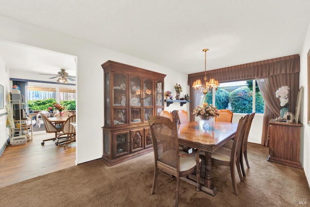410 Duvall Ct, Benicia, CA 94510 - dining space with carpet and ceiling fan with notable chandelier