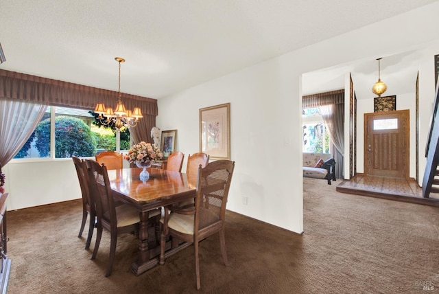 410 Duvall Ct, Benicia, CA 94510 - dining space featuring dark carpet and a chandelier
