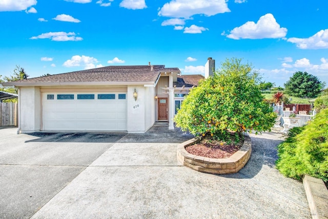 410 Duvall Ct, Benicia, CA 94510 - single story home with driveway, stucco siding, fence, and an attached garage