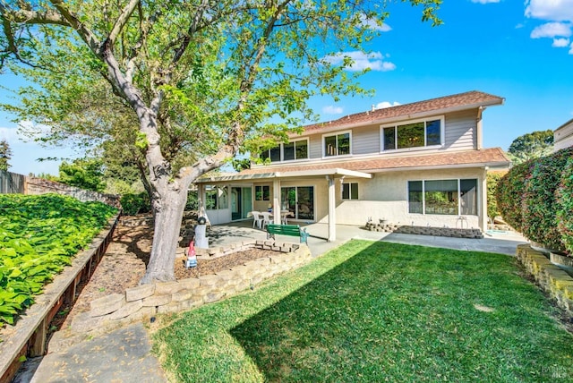 410 Duvall Ct, Benicia, CA 94510 - rear view of house with a patio, a yard, stucco siding, and fence
