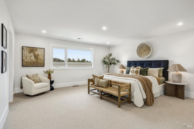 bedroom with carpet, visible vents, and recessed lighting