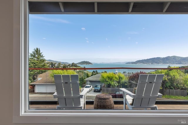 exterior details featuring a water and mountain view