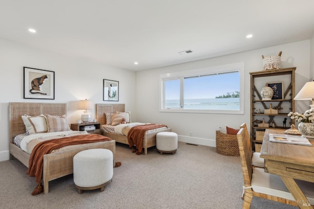 carpeted bedroom featuring baseboards, recessed lighting, and visible vents