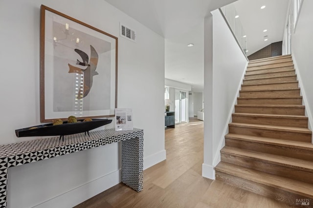 living area with a notable chandelier, recessed lighting, a mountain view, visible vents, and a brick fireplace