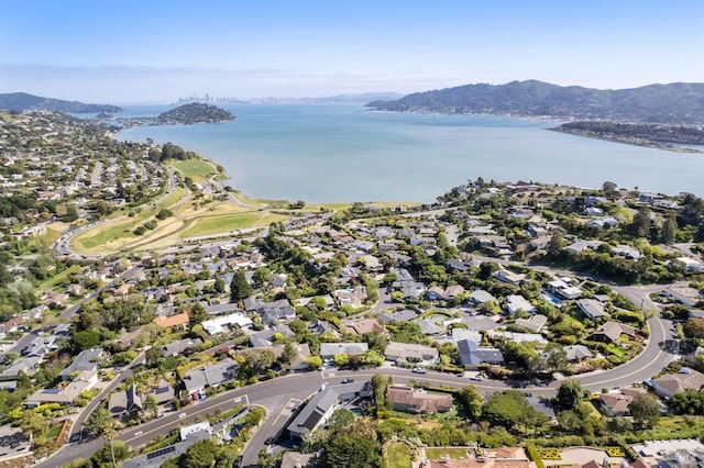 bird's eye view featuring a water and mountain view and a residential view