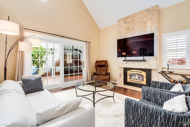 1206 Cayetano Dr, Napa, CA 94559 - living area featuring a high end fireplace, wood finished floors, and plenty of natural light