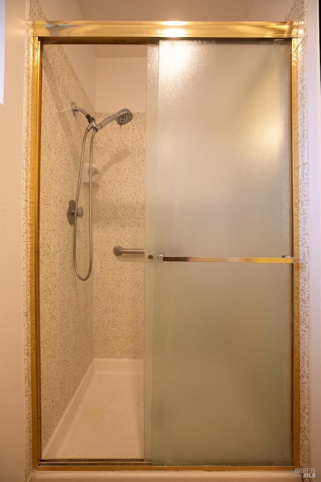 bathroom featuring a stall shower