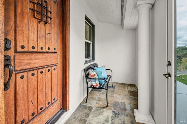 entrance to property with stucco siding