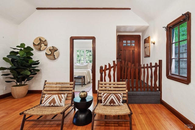12 Jones Way, Larkspur, CA 94939 - living area featuring hardwood / wood-style floors, baseboards, and vaulted ceiling