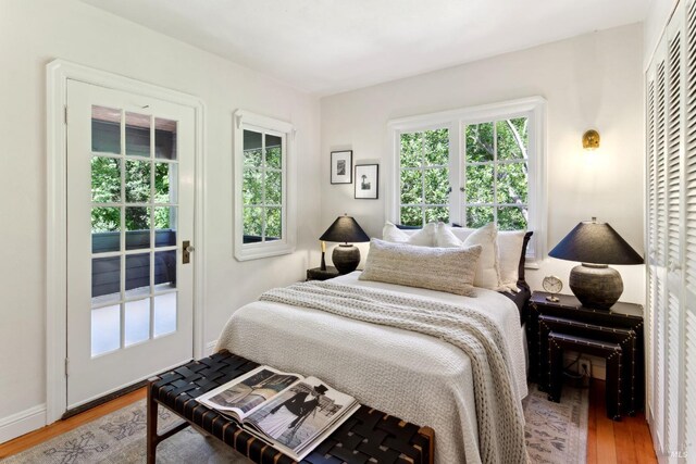 12 Jones Way, Larkspur, CA 94939 - bedroom featuring access to outside and wood finished floors