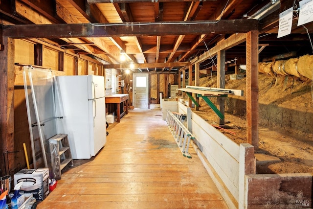 12 Jones Way, Larkspur, CA 94939 - below grade area with light wood finished floors and freestanding refrigerator