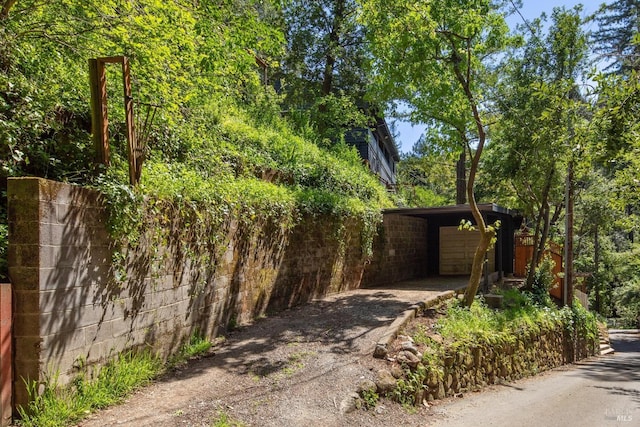 12 Jones Way, Larkspur, CA 94939 - view of property exterior with a garage, driveway, and fence