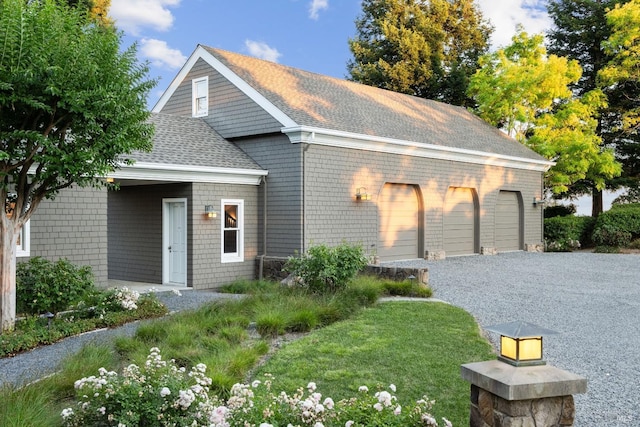 view of front of house featuring a shingled roof