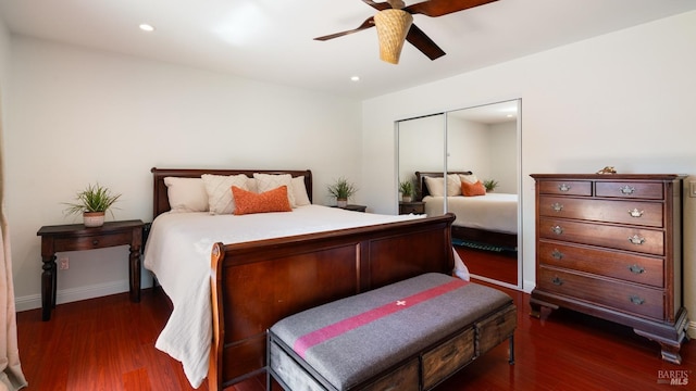 bedroom featuring dark wood-style floors, a closet, ceiling fan, and recessed lighting