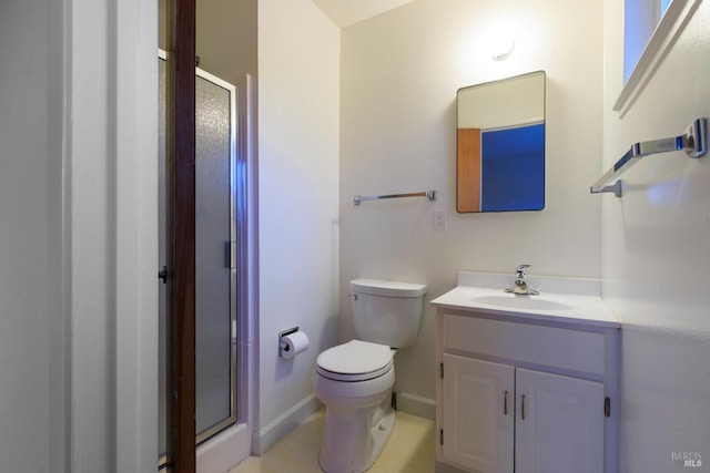 bathroom with toilet, a stall shower, baseboards, and vanity