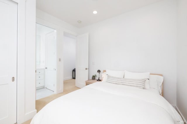 bedroom featuring recessed lighting and light colored carpet