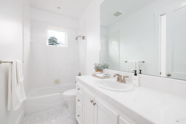full bath with toilet, vanity, bathtub / shower combination, and visible vents