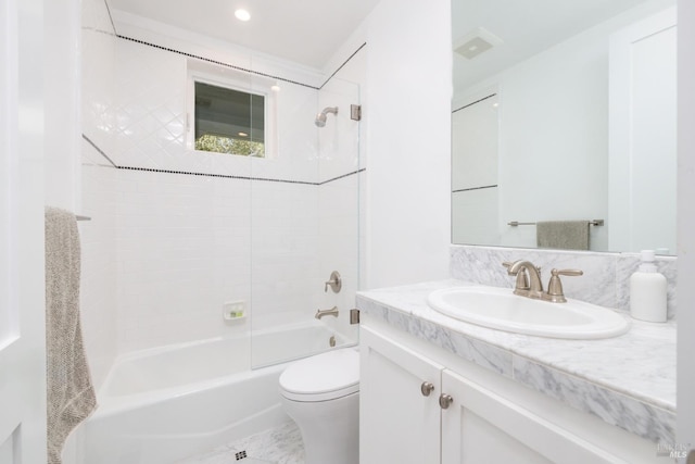 bathroom with vanity, bathtub / shower combination, and toilet