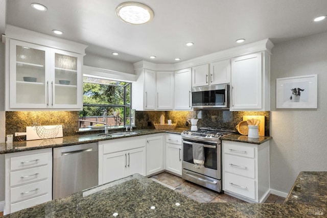1036 Summit Ave, Napa, CA 94559 - kitchen featuring stainless steel appliances, a sink, white cabinetry, decorative backsplash, and recessed lighting