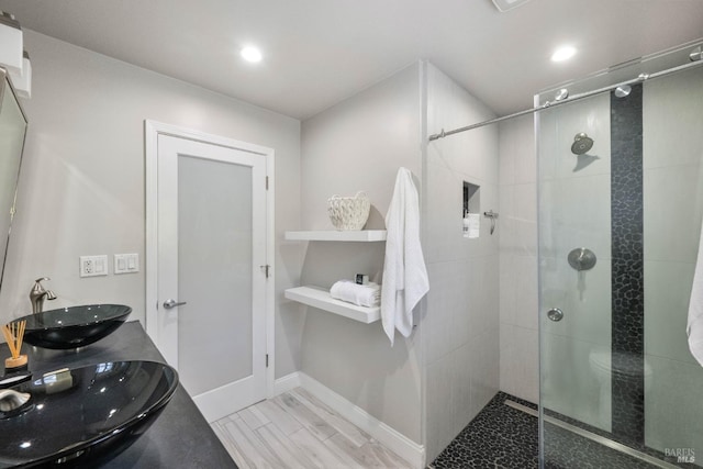1036 Summit Ave, Napa, CA 94559 - bathroom with a sink, a shower stall, recessed lighting, and baseboards