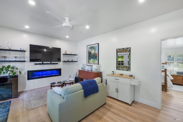 1036 Summit Ave, Napa, CA 94559 - living area with a glass covered fireplace, light wood-style floors, ceiling fan, and recessed lighting