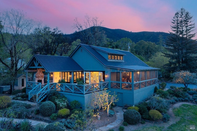 view of front of house featuring a mountain view