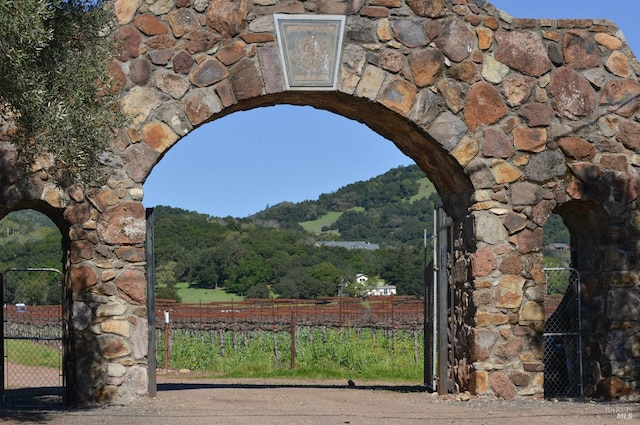 view of gate featuring fence