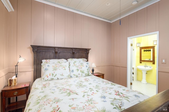 2410 S Fitch Mountain Rd, Healdsburg, CA 95448 - bedroom with a decorative wall, ensuite bath, crown molding, and a sink