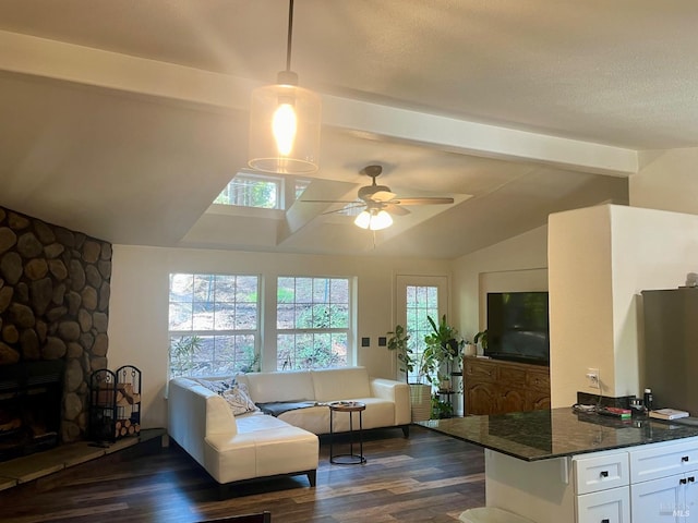 2032 Goose Rd, Willits, CA 95490 - living area with dark wood-style floors, a ceiling fan, and a stone fireplace