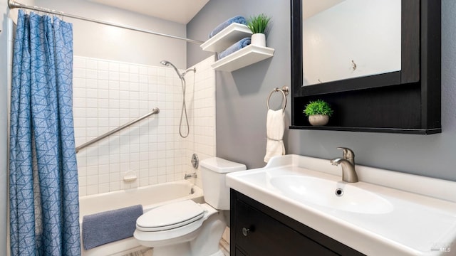 bathroom featuring vanity, shower / bath combo, and toilet