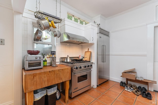 55 Sunshine Ave, Sausalito, CA 94965 - kitchen featuring high end appliances, wall chimney range hood, ornamental molding, wooden counters, and decorative backsplash