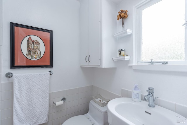 55 Sunshine Ave, Sausalito, CA 94965 - half bath with wainscoting, tile walls, a sink, and toilet