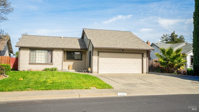 single story home with an attached garage, driveway, fence, and a front lawn