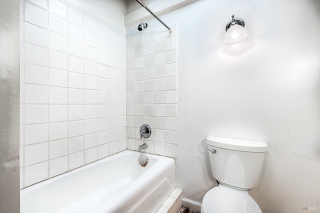 full bathroom featuring toilet and shower / bathtub combination