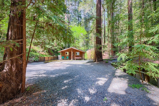 view of yard featuring a wooded view