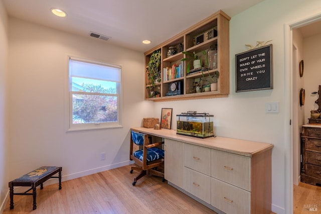 office space with light wood-style flooring, baseboards, visible vents, and recessed lighting