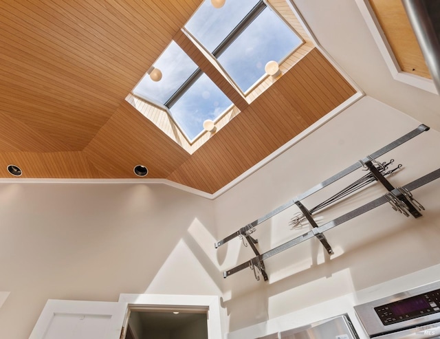 interior details featuring wooden ceiling and ornamental molding