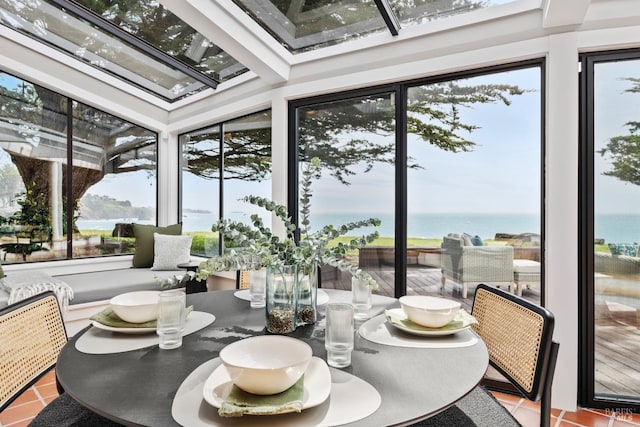 sunroom / solarium with tile patterned flooring