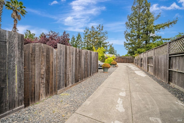 exterior space featuring concrete driveway