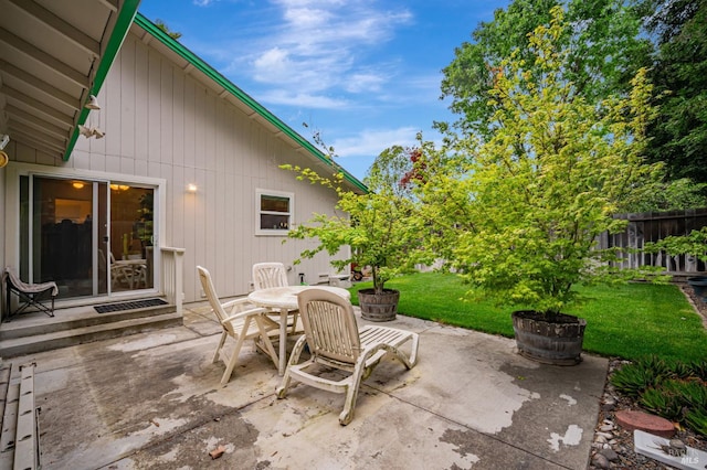view of patio / terrace featuring fence