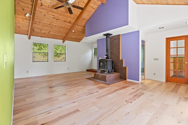 unfurnished living room with wood ceiling, wood finished floors, and high vaulted ceiling