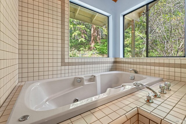 bathroom featuring a whirlpool tub