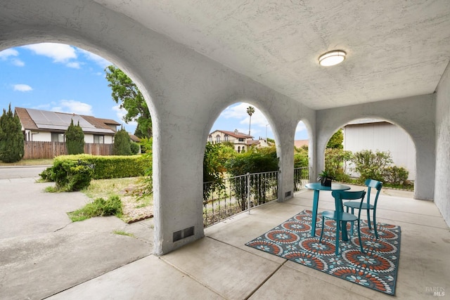 view of patio / terrace with fence